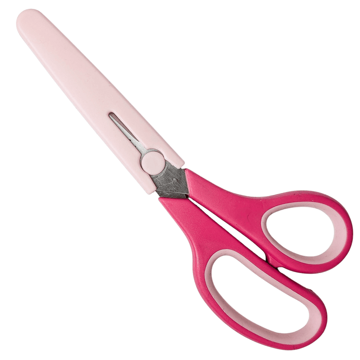 Pink scissors with a sheath on a white background