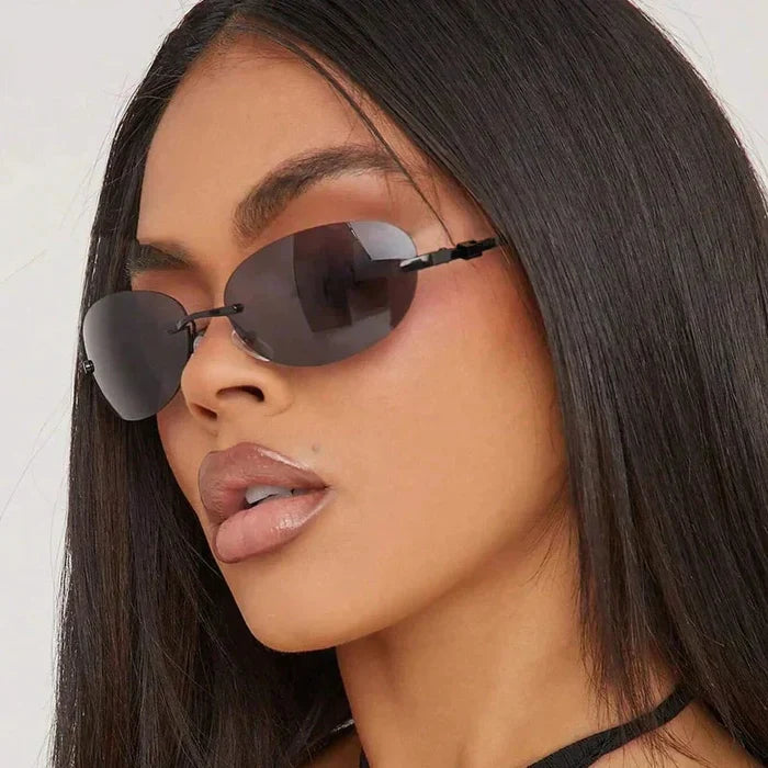 Leichte unisex Sonnenbrille – randlos oval, hochwertiger Kunststoff, für Strand und Stadt 1