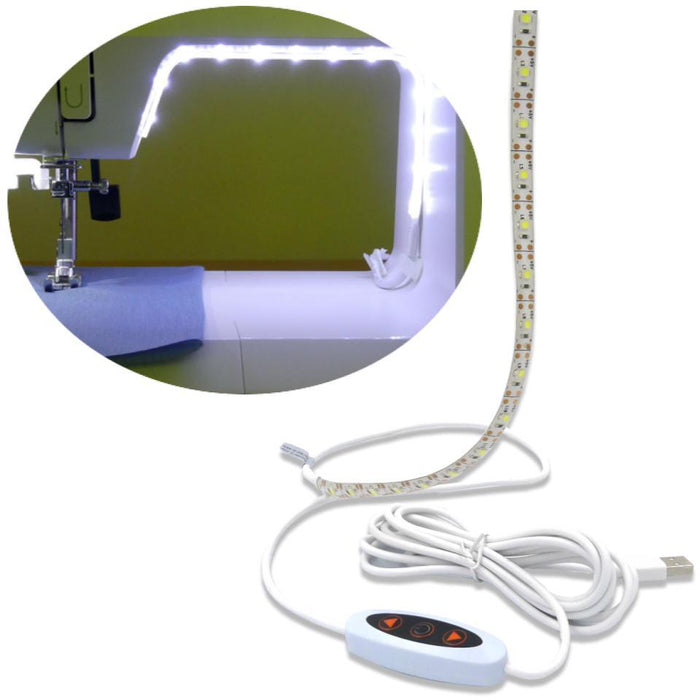 A Light Strip  attached to a sewing machine plus the strip and cord and switch