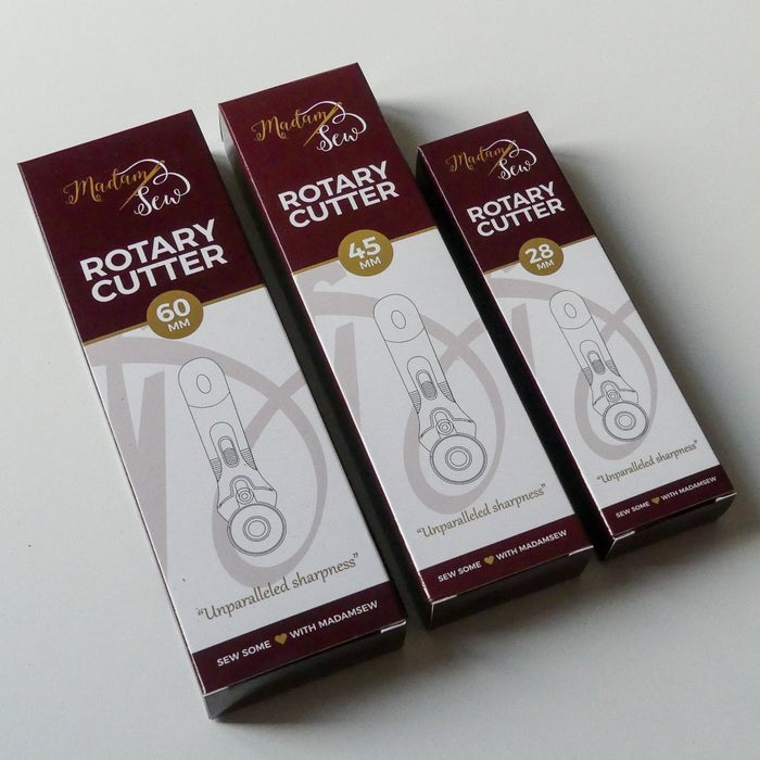 packaging of 3 sizes of rotary cutters